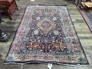 Persian hand-knotted woollen rug
