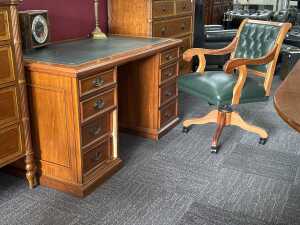 Executive twin pedestal desk with matching office chair