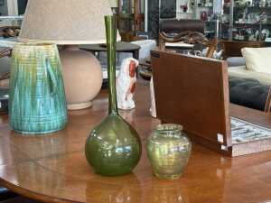 Two green art glass vases