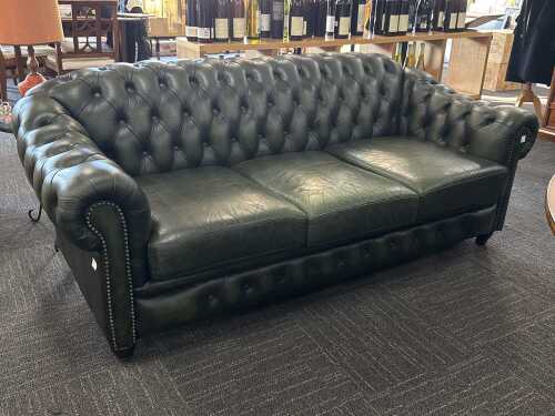 Cheserfield three-seater green leather sofa