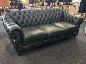 Cheserfield three-seater green leather sofa