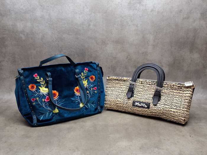 Two designer style handbags