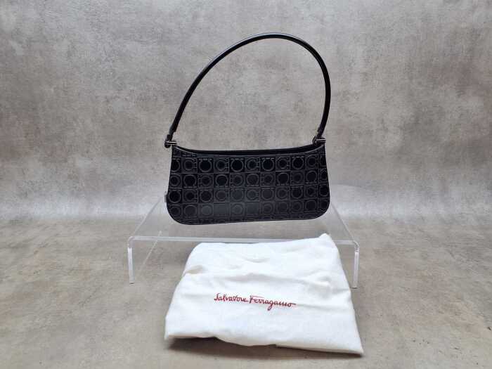 Designer-style embossed leather shoulder bag with silver-tone hardware.