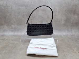 Designer-style embossed leather shoulder bag with silver-tone hardware.