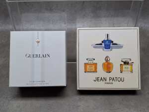 Two boxed perfume sets