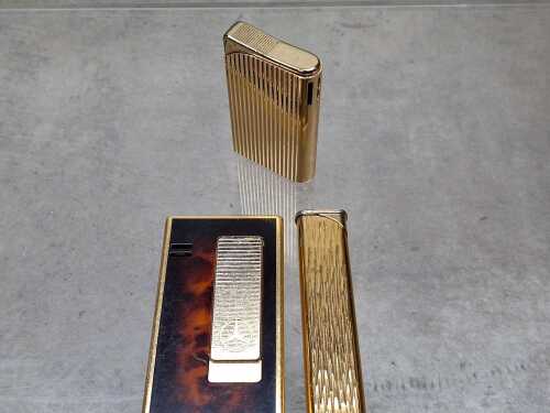 Mercedes-Benz, Cartier, Juvena, five vintage lighters