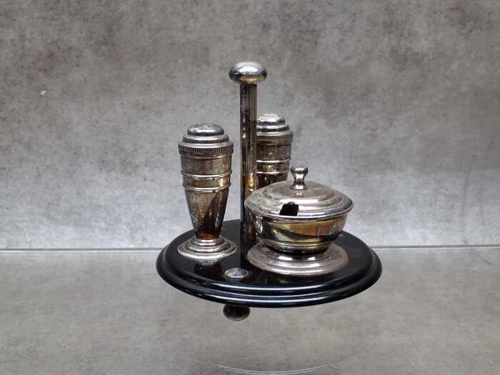 Art Deco silver-plated condiment set on ebonised timber caddy
