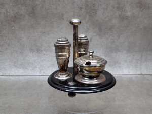 Art Deco silver-plated condiment set on ebonised timber caddy