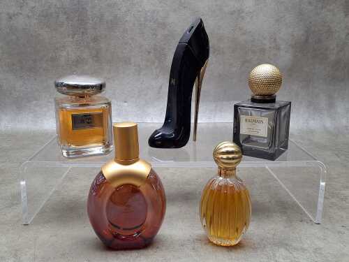 Five vintage designer perfume bottles