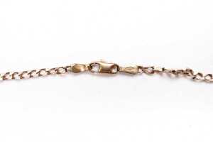 A curb link chain in 9 carat yellow gold - 4