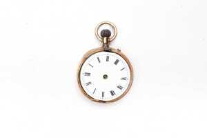 An antique pocket watch in 14 carat yellow gold