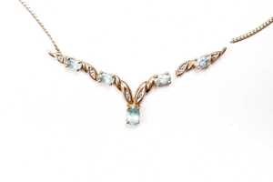 A broken blue topaz and diamond necklace in 9 carat yellow gold - 2