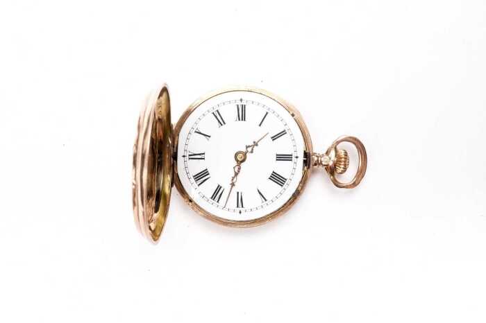 An antique rolled gold pocket watch