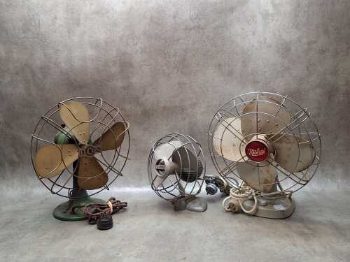 Three vintage metal desk fans