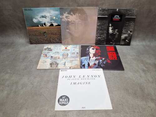Six John Lennon vinyl records