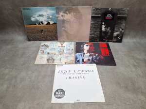 Six John Lennon vinyl records