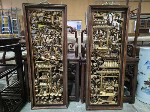 Pair of carved giltwood panels