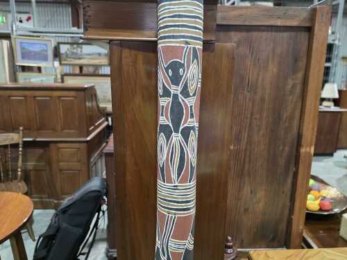 Indigenous Australian didgeridoo with ochre decoration