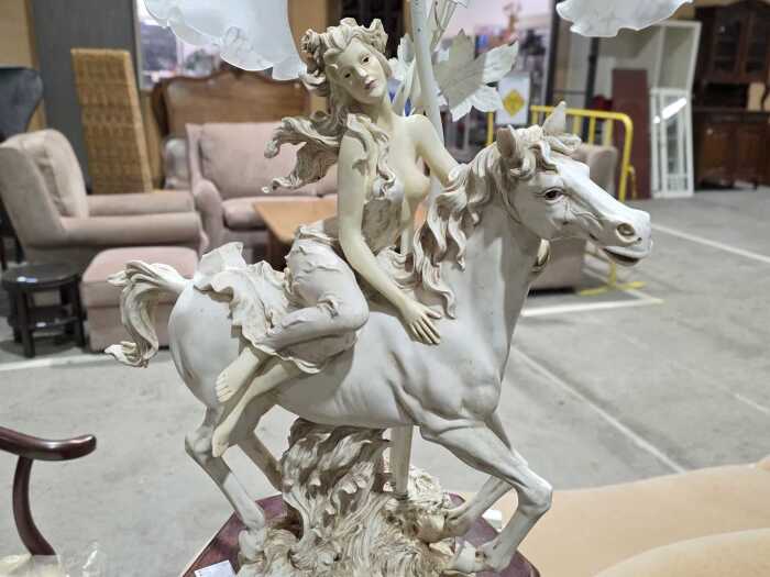 The Milano Collection figural woman on a horse lamp with tulip shades