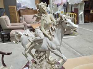 The Milano Collection figural woman on a horse lamp with tulip shades