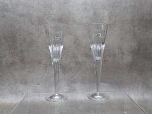 Two Waterford Crystal champagne glasses