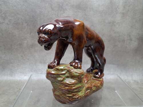 Porcelain figure of a snarling panther by Wye (artist unknown), made 1981