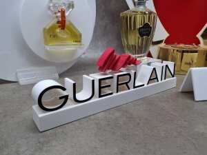 Five perfume shop displays and placards, some with perfume bottles - 6