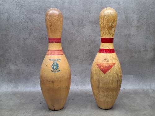 Two vintage bowling pins