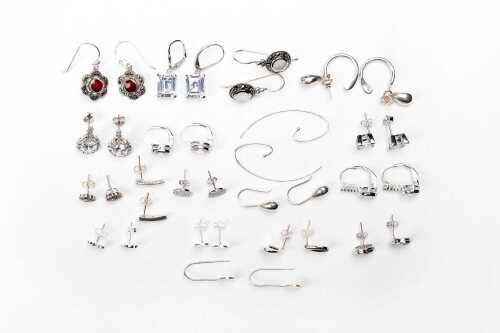 A collection of earrings in sterling silver