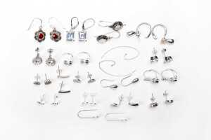 A collection of earrings in sterling silver