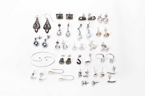 A collection of earrings in sterling silver