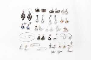 A collection of earrings in sterling silver