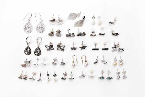 A collection of earrings in sterling silver