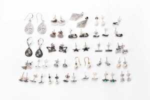 A collection of earrings in sterling silver