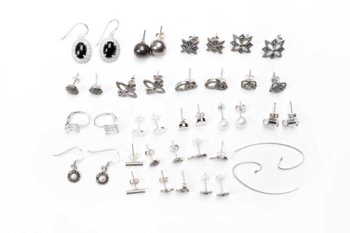 A collection of earrings in sterling silver