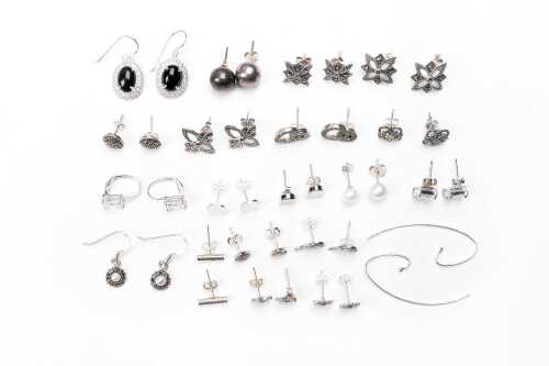 A collection of earrings in sterling silver