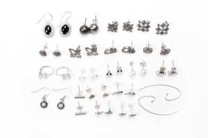 A collection of earrings in sterling silver