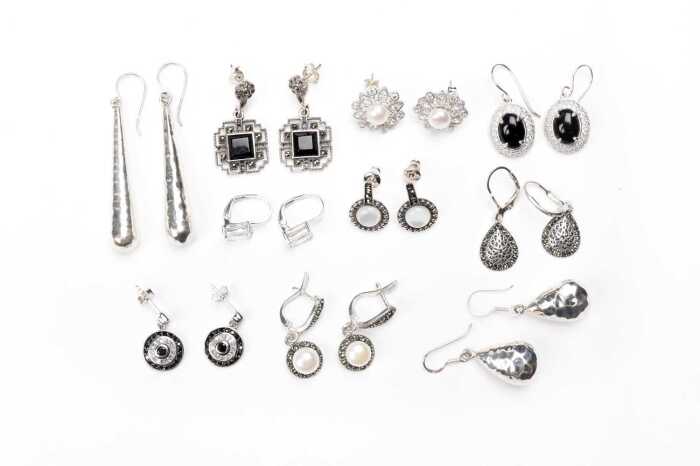 A collection of earrings in sterling silver