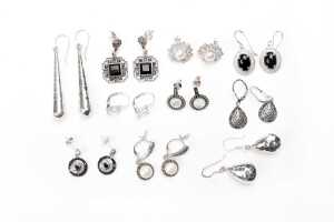 A collection of earrings in sterling silver