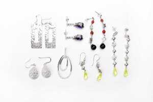 A collection of earrings and one pendant in sterling silver