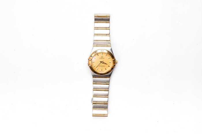 A ladies Omega constellation quartz ladies watch in stainless steel and 18ct gold plating