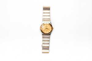 A ladies Omega constellation quartz ladies watch in stainless steel and 18ct gold plating