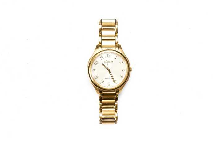 A Citizen Eco Drive watch in gold plated stainless steel