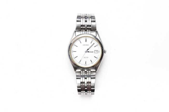 A Seiko SQ 50 watch in stainless steel