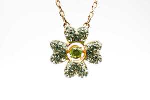 A Swarovski green Idyllia necklace in yellow gold tone - 2