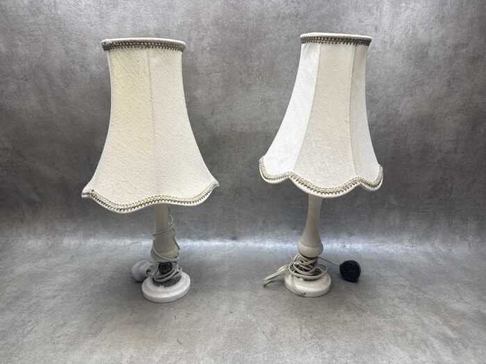 Two alabaster and metal table lamps with fabric shades