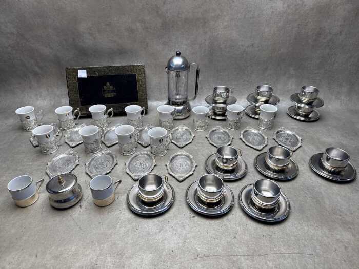 Group of demitasse and Glasnost Italian espresso maker
