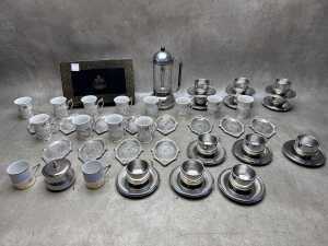Group of demitasse and Glasnost Italian espresso maker