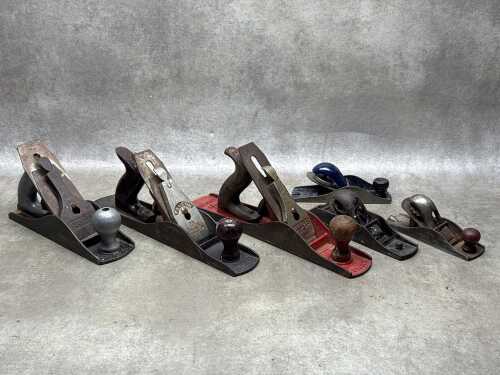 Six vintage hand planes