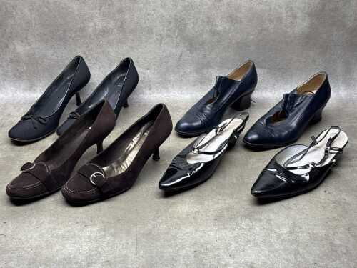 Four pairs of designer-style women's shoes